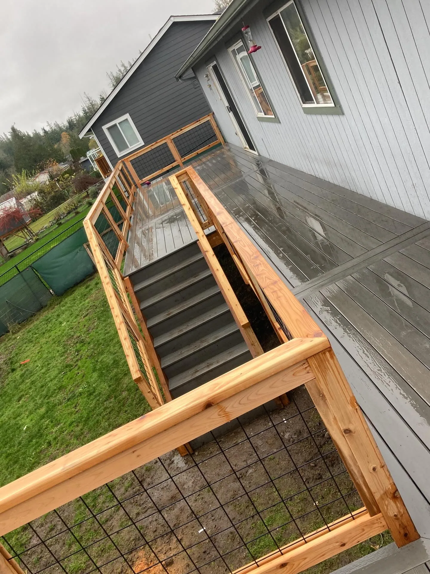 Deck staircase cedar handrail wire panel infill