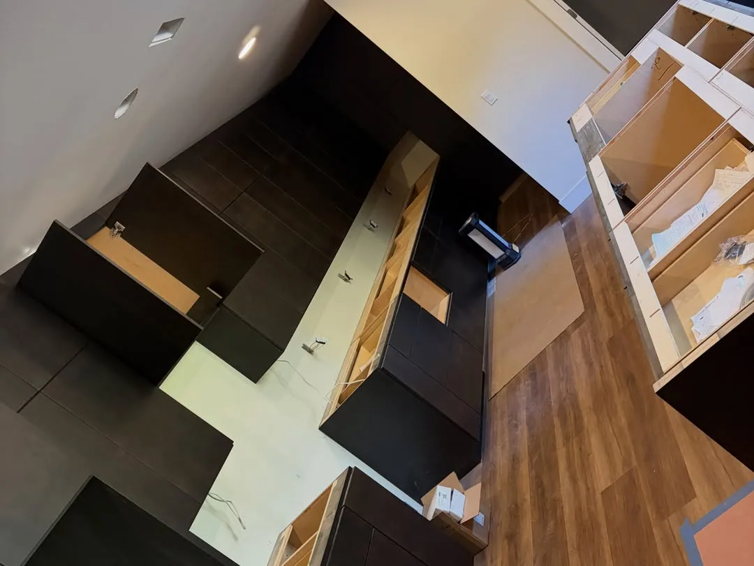 Kitchen cabinet installation dark cabinetry remodel