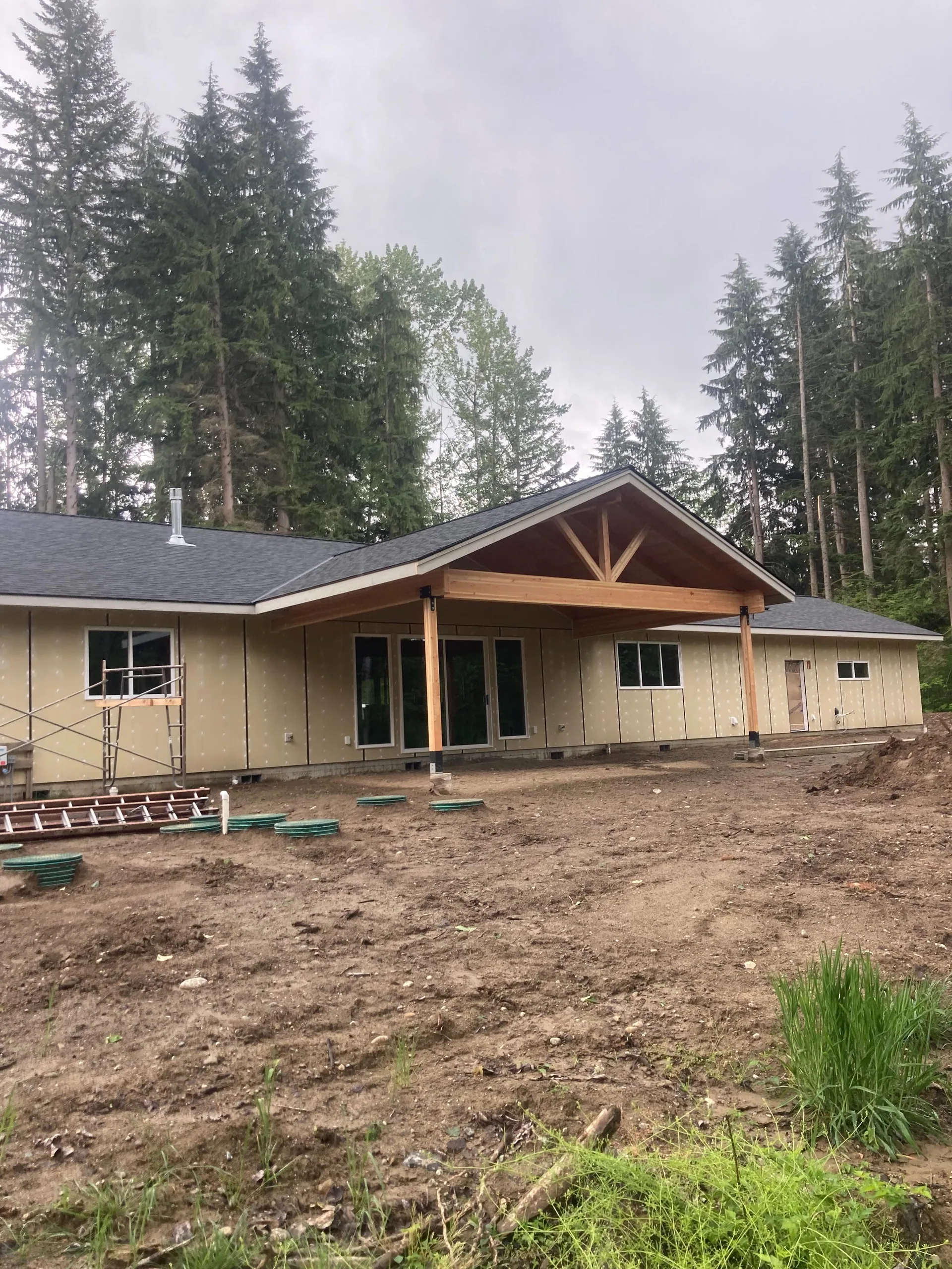 New construction home timber framed covered porch