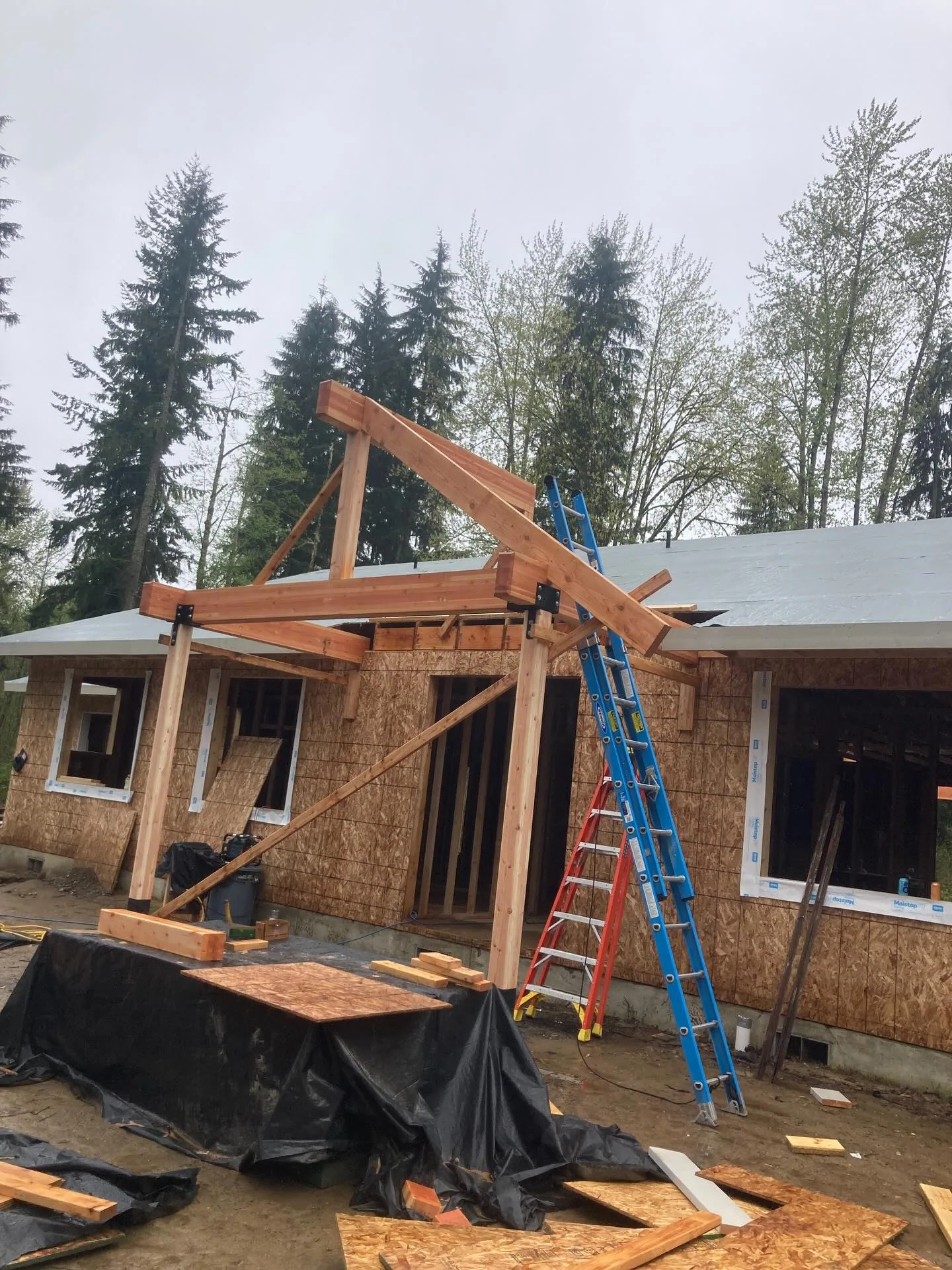 Timber entry porch posts beam ladders osb ranch