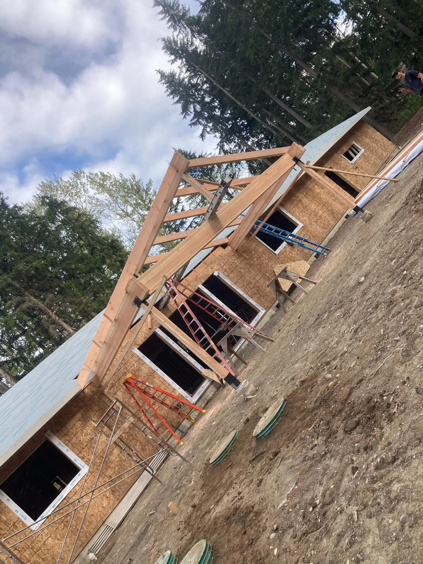 Timber frame porch beams new home construction