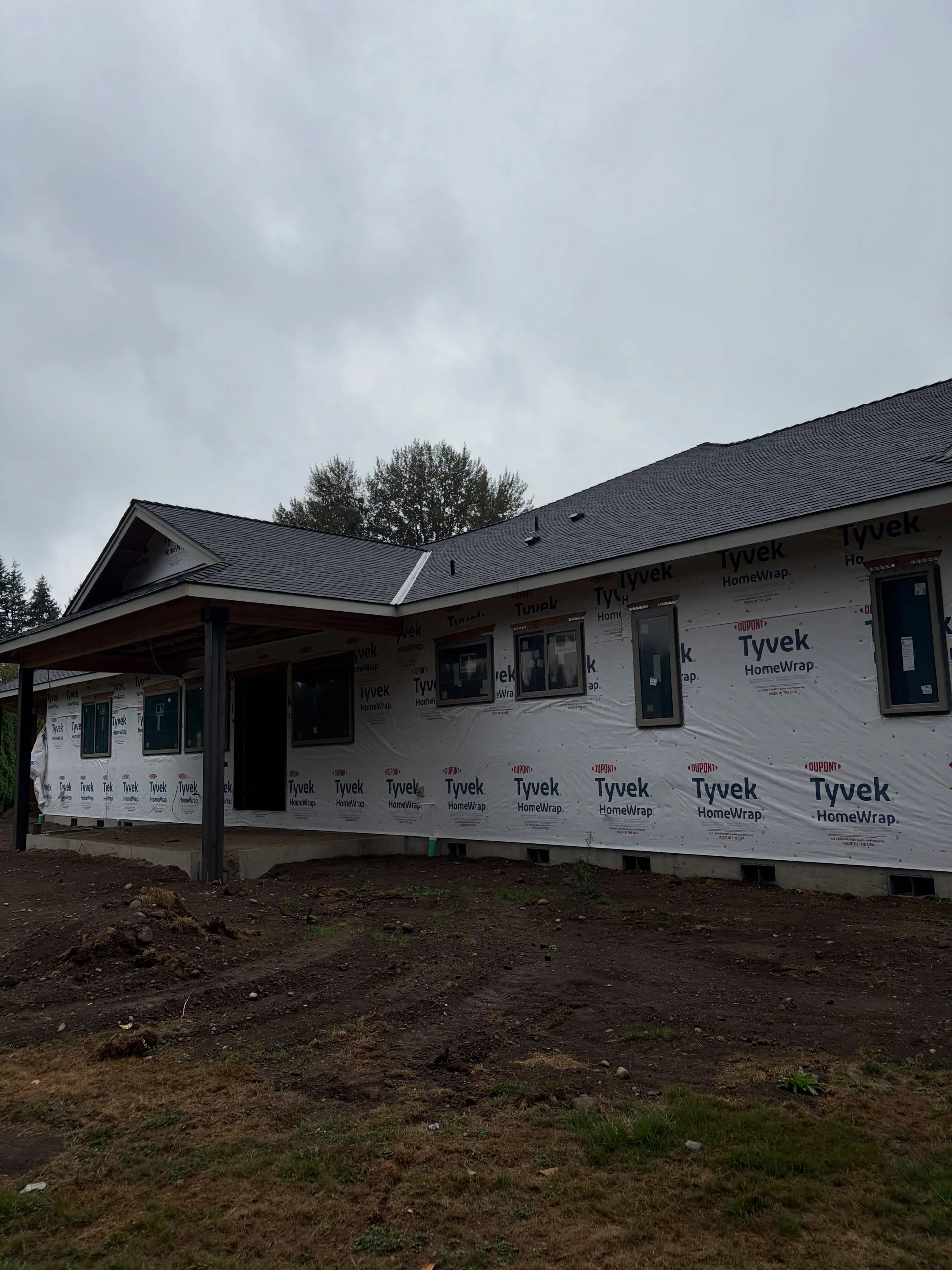 Tyvek wrapped custom home covered porch